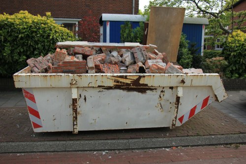 Household skip container placed in a Palmers Green garden